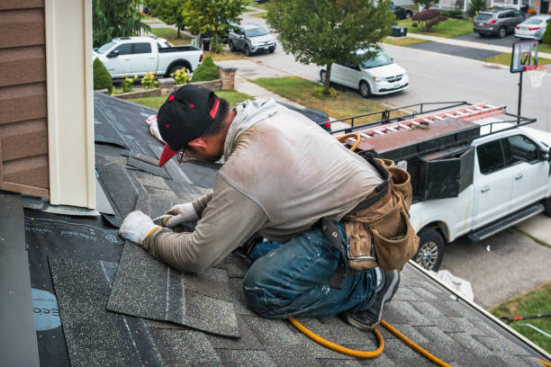 Professional Flat Roof Repair technician working in Canterbury, NH